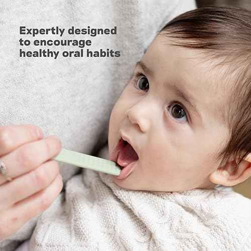 ezpz Baby-Led Toothbrush + Tongue Depressor Dual Pack (Sage) - 100% Silicone Toothbrush + Silicone/Stainless Steel Tongue Depressor - Helps Set-up Infants for a Healthy Oral Care Routine