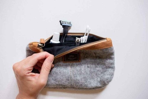 Mountain Made Wool and Pure Leather Luxury Travelers Small Cosmetic Bag, Toiletries, or Utility Bag For Students, Women and Men. Perfect size to fit inside your purse.