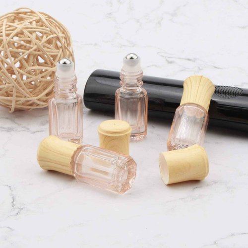 Newzoll 10Pcs Essential Oil Roller Bottles 3ml Pink Glass Roll on Vials Perfume Sample Jars Cosmetics Tube Vials Containers with Funnel