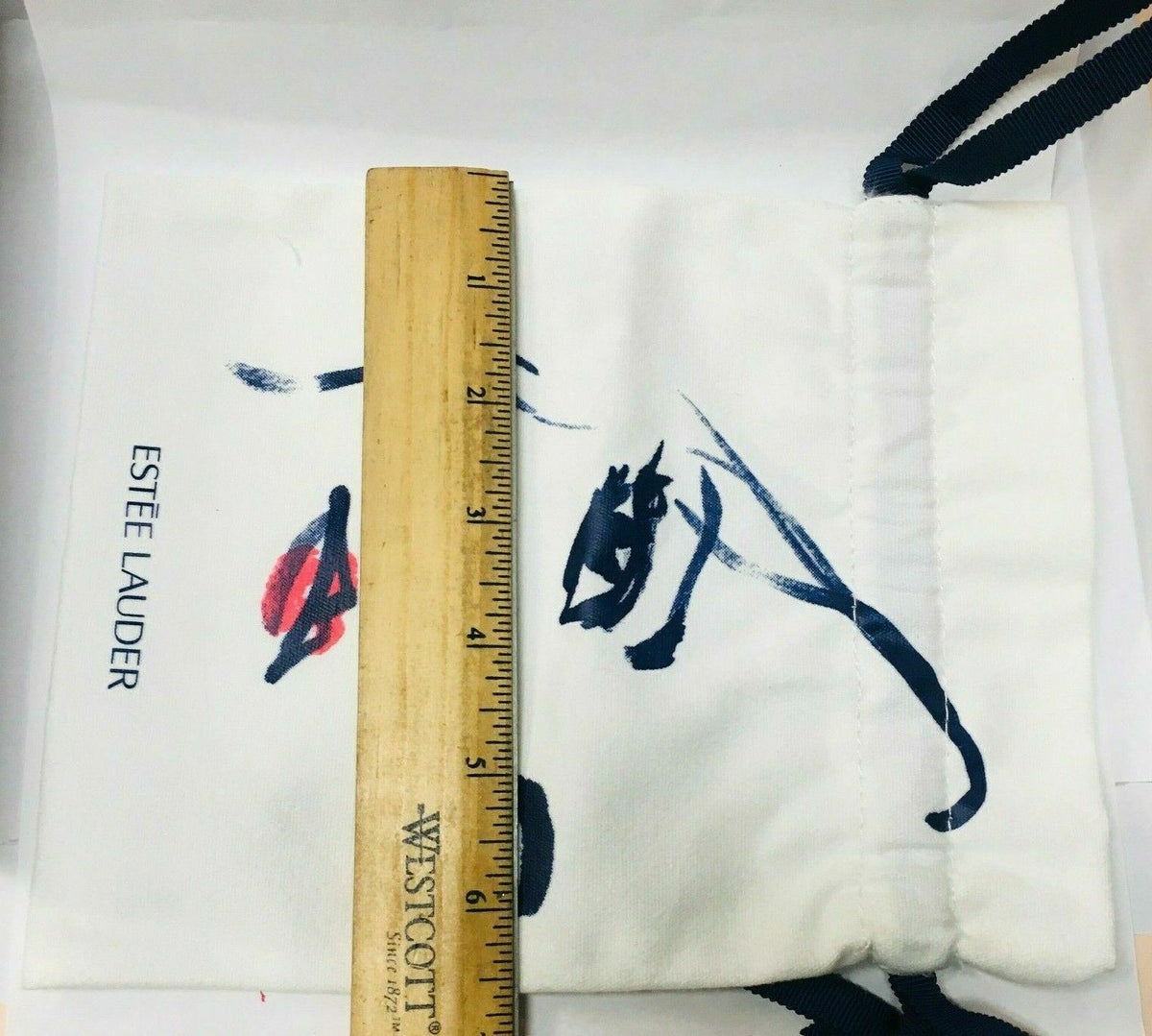 Estée Lauder White & Blue Drawstring Bag – Authentic Cosmetic Accessory