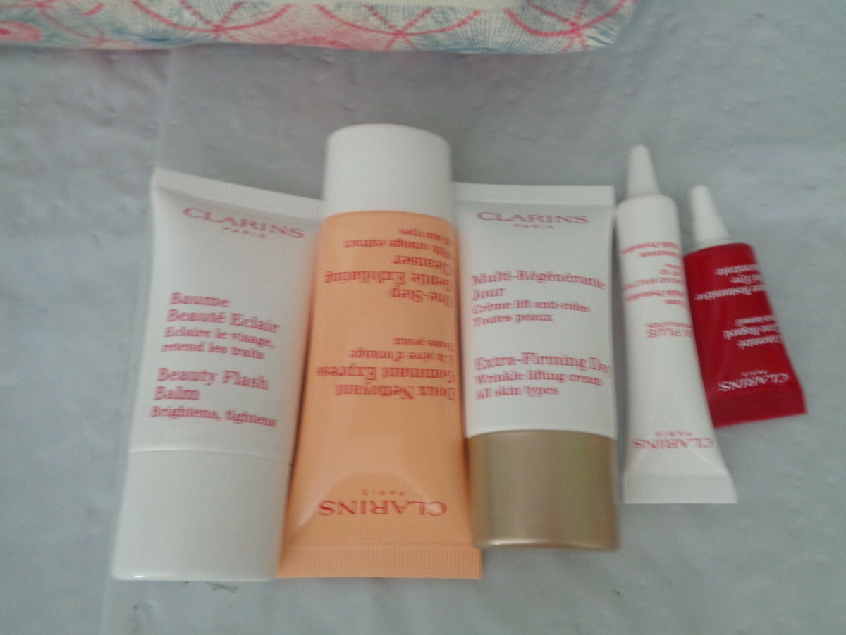 Makeup Bag with 5 Travel Samples - Clarins Feed 10 New