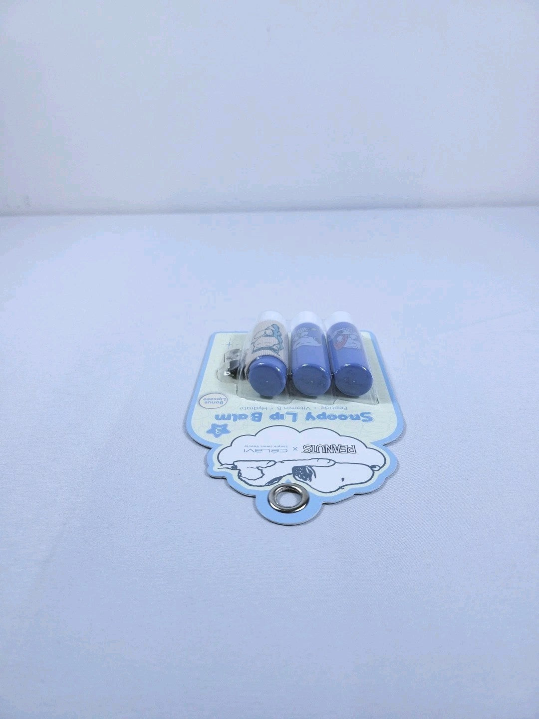 Snoopy Lip Balm Set with 3 Flavors and Bonus Case - Peanuts x Celavi