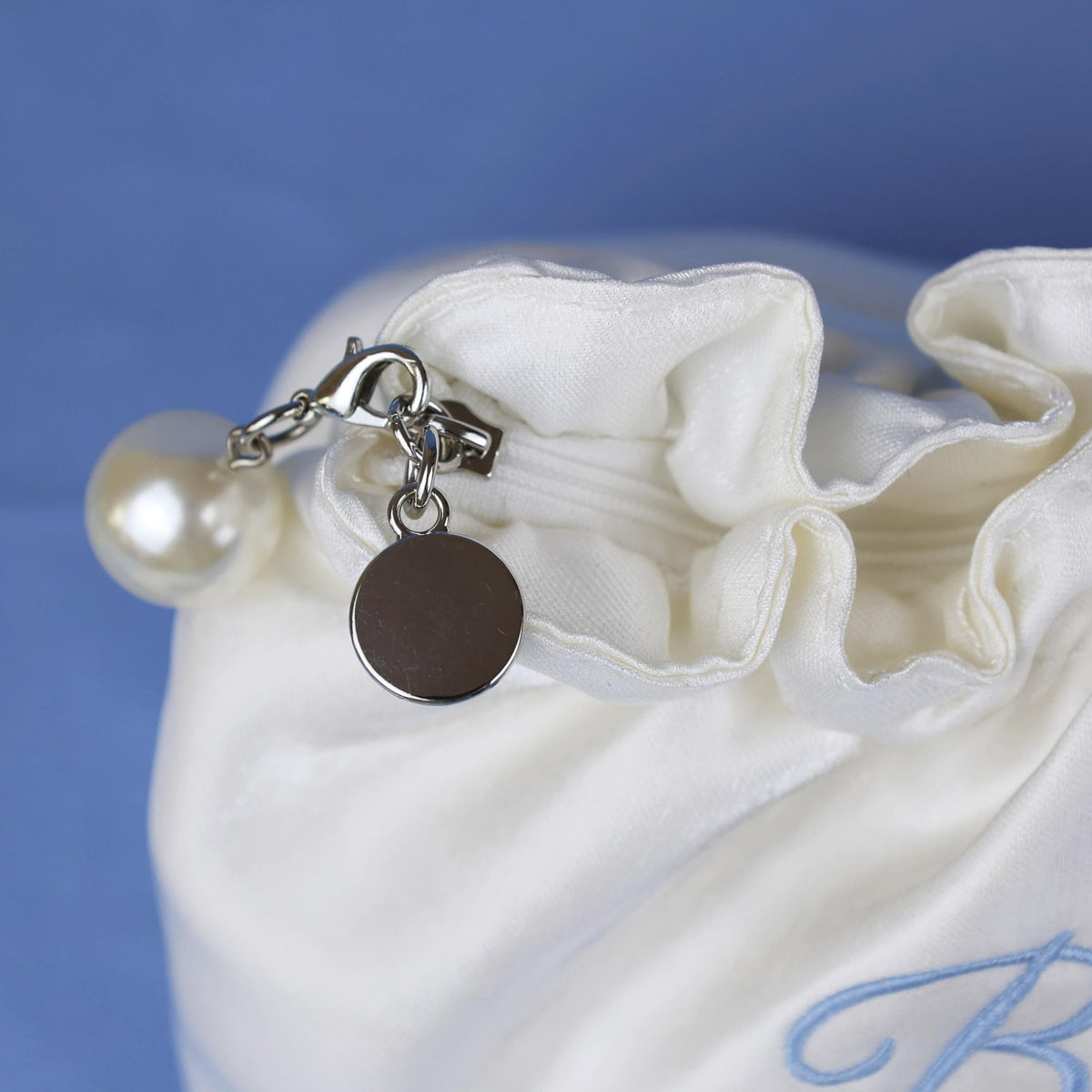 White Satin Bridal Cosmetic Bag with Blue Embroidery and Pearl Zipper