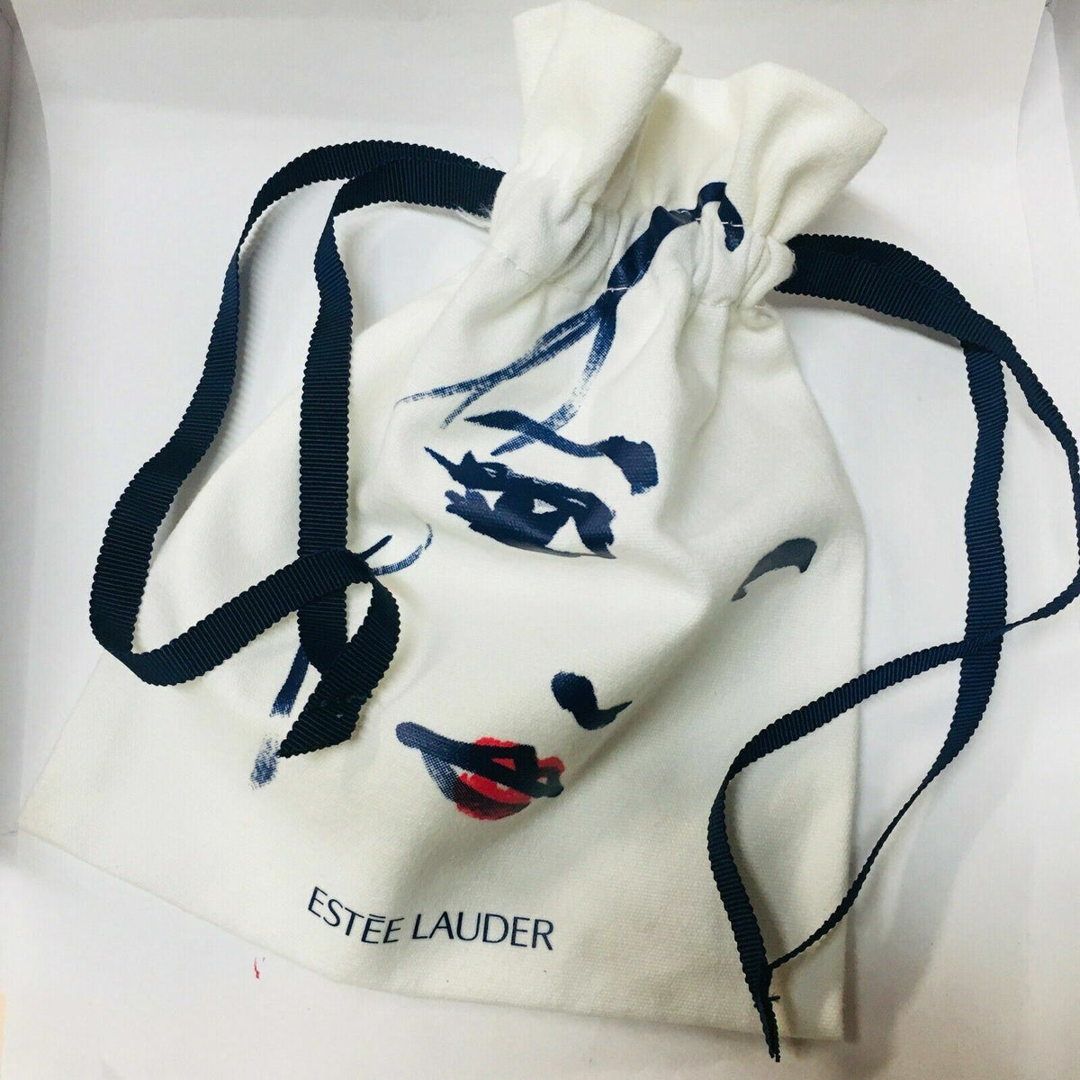 Estée Lauder White & Blue Drawstring Bag – Authentic Cosmetic Accessory