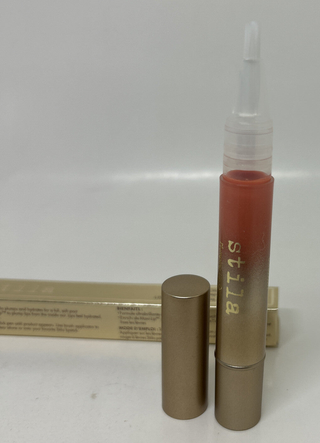 High-Shine Lip Gloss with Plumping & Hydrating Benefits - Prosecco