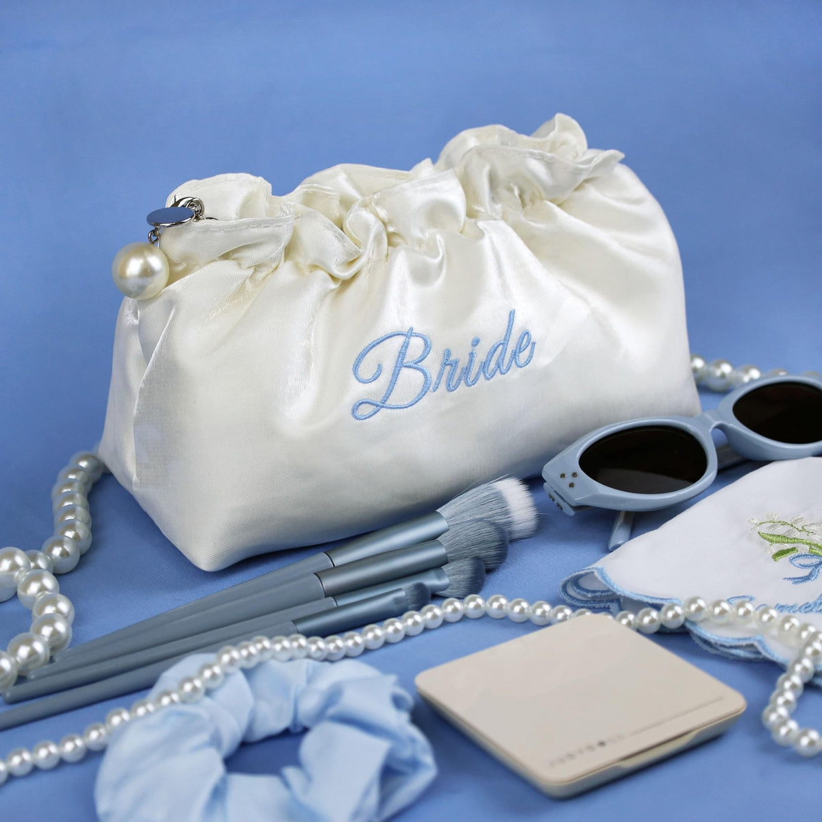 White Satin Bridal Cosmetic Bag with Blue Embroidery and Pearl Zipper