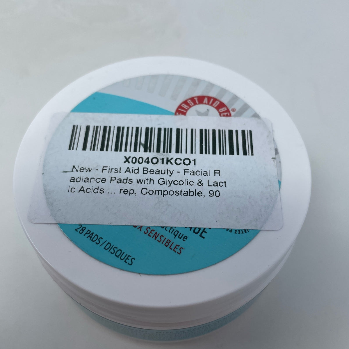 First Aid Beauty Facial Radiance Pads, White/Aqua Jar, 28 ct