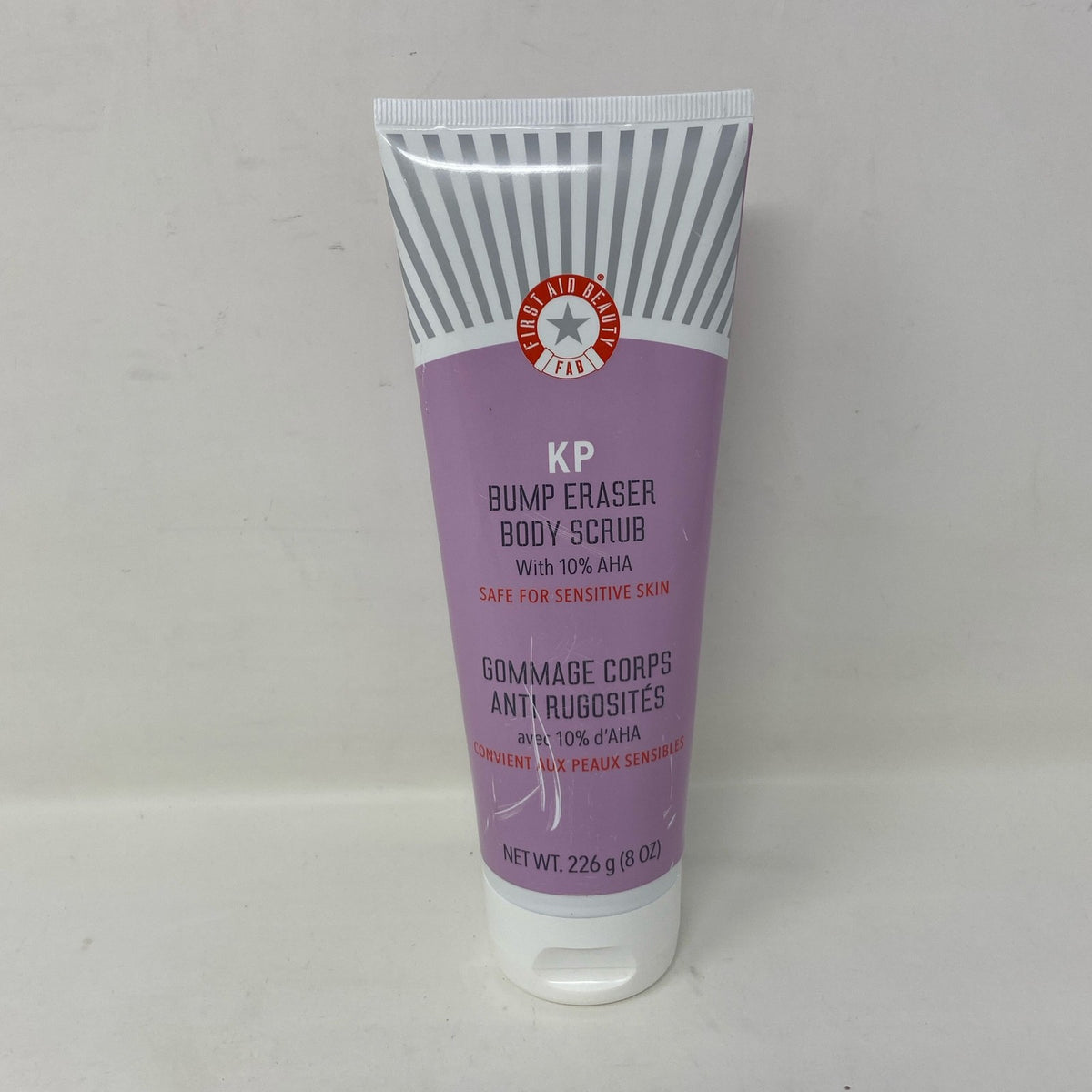 First Aid Beauty KP Bump Eraser 10% AHA Body Scrub, Original 8 oz