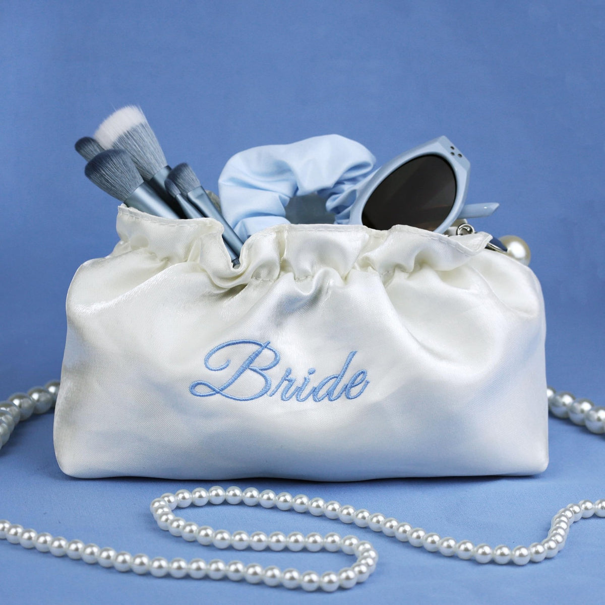 White Satin Bridal Cosmetic Bag with Blue Embroidery and Pearl Zipper