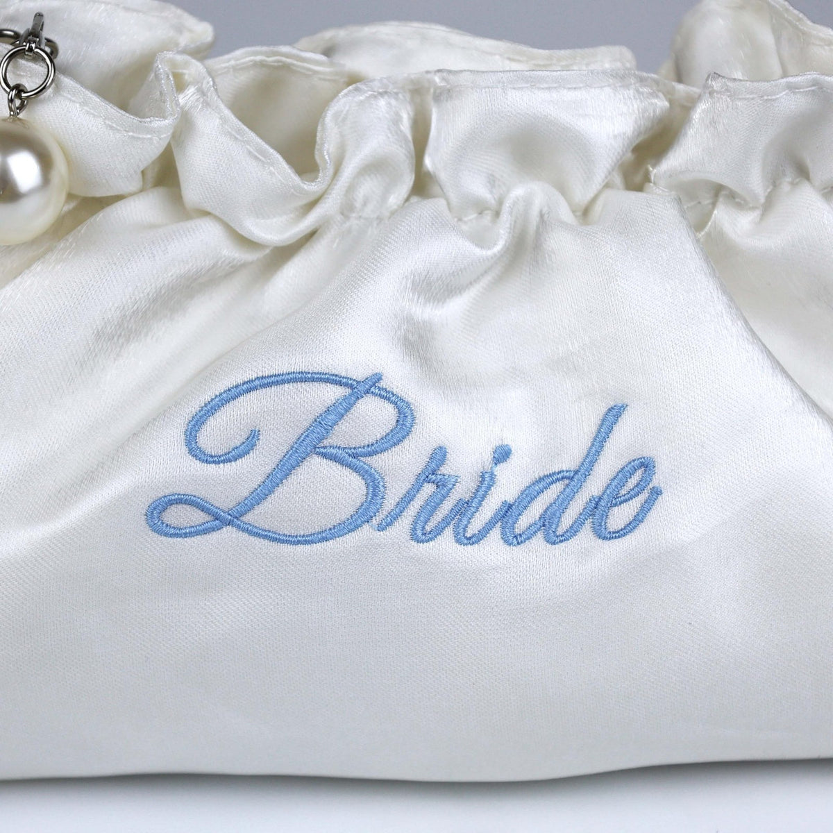 White Satin Bridal Cosmetic Bag with Blue Embroidery and Pearl Zipper