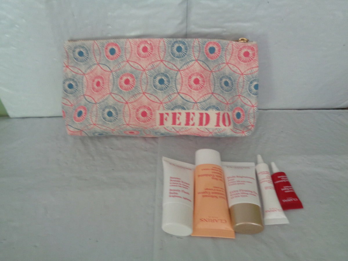 Makeup Bag with 5 Travel Samples - Clarins Feed 10 New