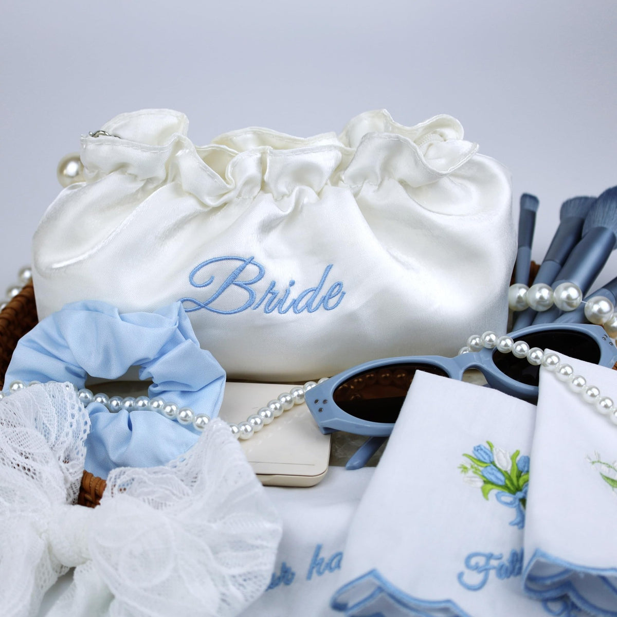 White Satin Bridal Cosmetic Bag with Blue Embroidery and Pearl Zipper