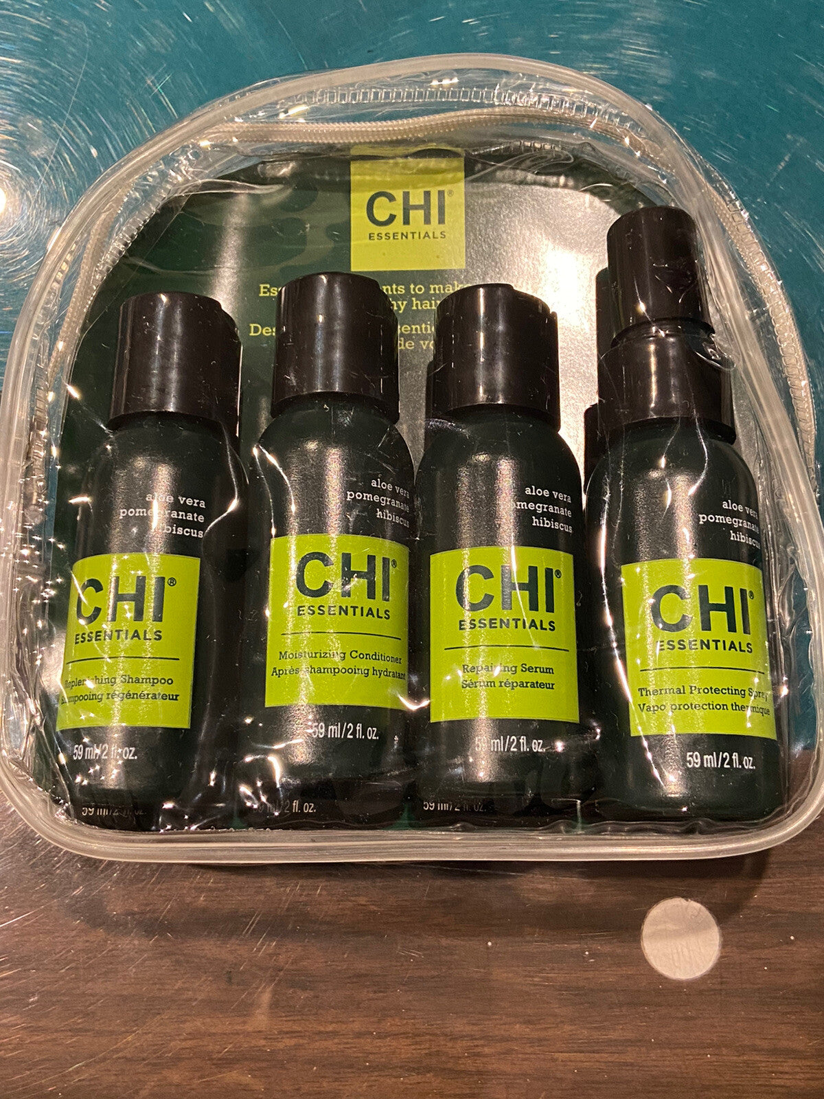 Two-AVON CHI Travel Kit Shampoo, Conditioner, Spray and Serum each 2