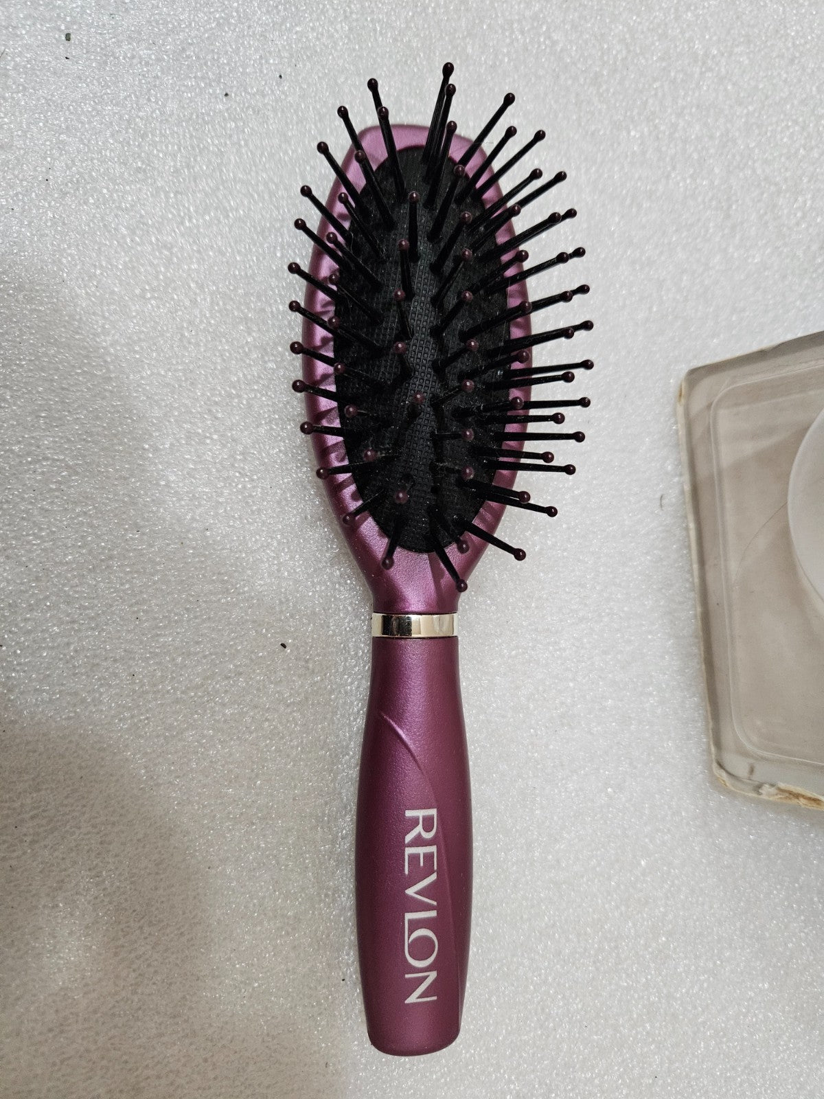 7-Inch Travel Grooming Brush with Nylon Bristles - Purple Revlon Cushion