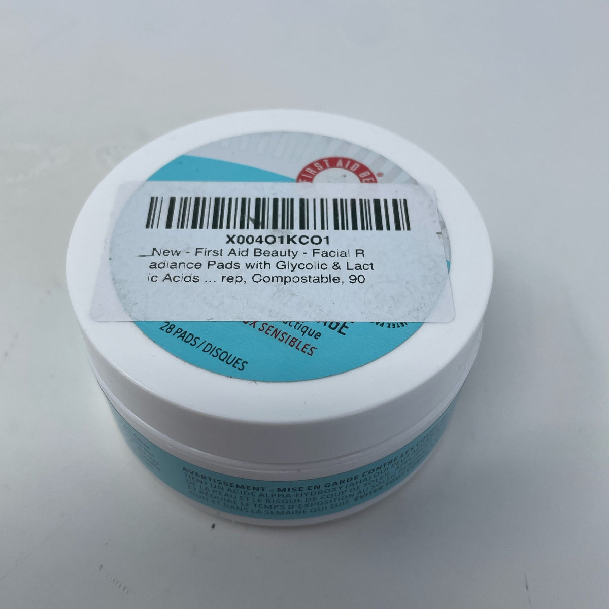 First Aid Beauty Facial Radiance Pads, White/Aqua Jar, 28 ct